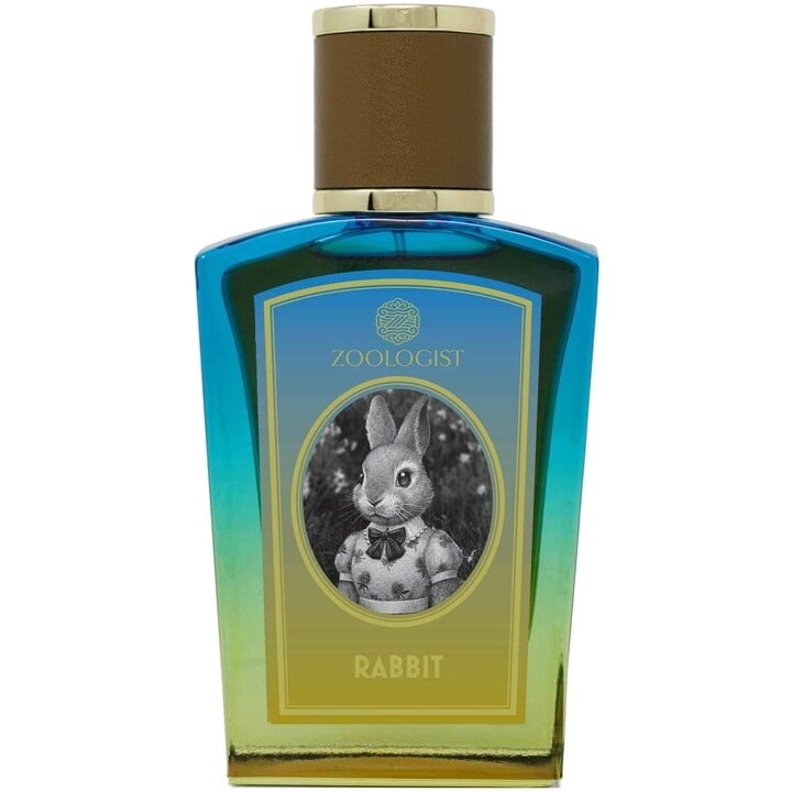 A perfume bottle labeled "Rabbit by Zoologist," featuring an illustration of a rabbit in formal attire on the front, emits an air of sophistication with notes of Green Vegetable Leaves Accord accentuating its allure.