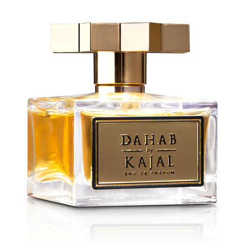 A square glass bottle of Dahab from the Kajal - Classic Collection Eau de Parfum features a golden cap and a labelled front. This 100ml EDP holds a golden-hued liquid, delivering an opulent fragrance.