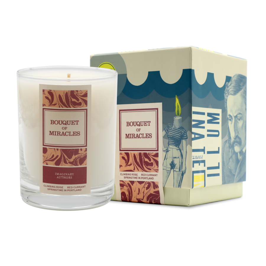 A white candle in a glass container labeled "Bouquet of Miracles" is placed next to its decorative box. The box features artistic illustrations and the text "Imaginary Authors" from Portland, Oregon. The scent features notes of Rose Red Currant, adding a touch of elegance.