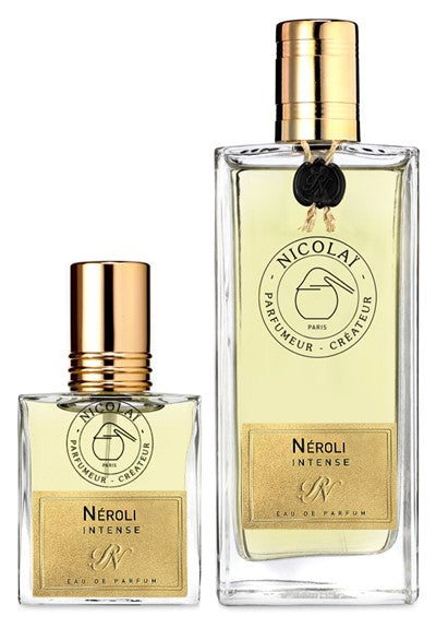 Two bottles of Nicolaï Neroli Intense Eau de Parfum with gold caps and labels. The larger bottle, exuding a rich fragrance, features a black wax seal, while the scent hints at vibrant notes of orange.