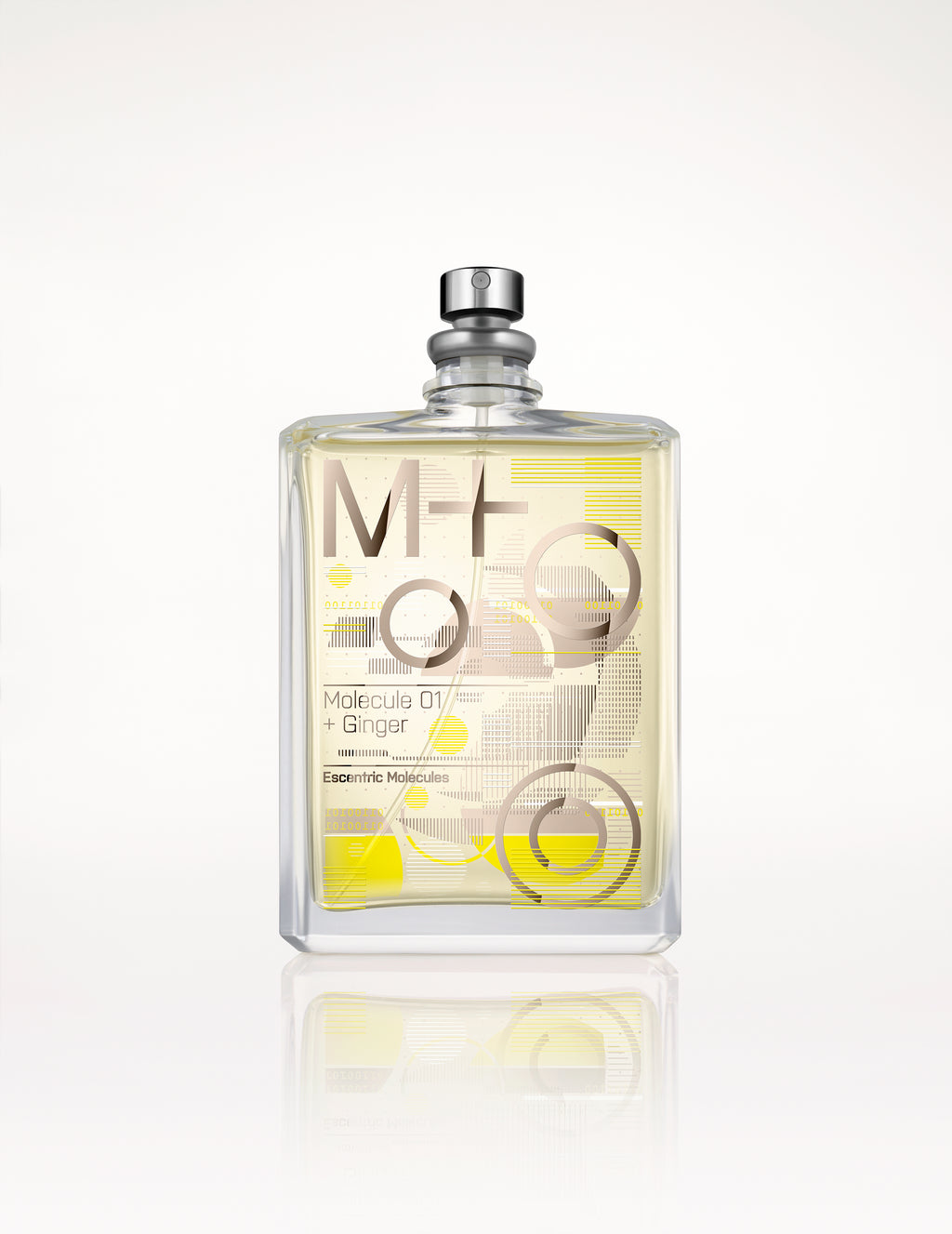 A clear rectangular bottle of Escentric Molecules' "Molecule 01 + Ginger" fragrance, adorned with a silver cap and graphic text design. This scent merges Iso E Super with the vibrant zest of ginger oil for an invigorating experience.
