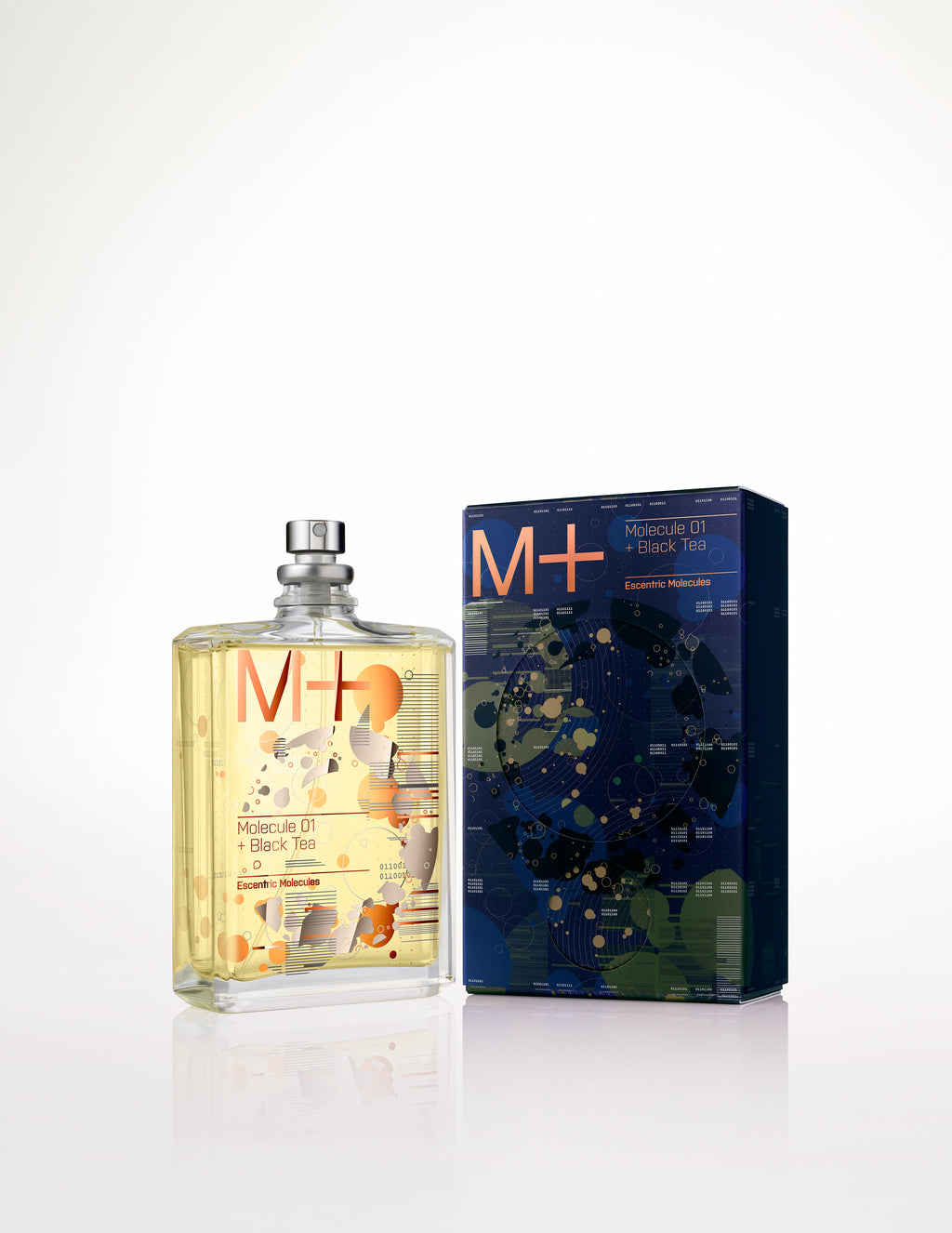 A clear perfume bottle labeled "Molecule 01 + Black Tea" from Escentric Molecules stands next to a dark blue box with the same branding. The bottle's light yellow liquid hints at Iso E Super, while the box features a complex, abstract design reminiscent of Molecule 01.