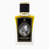 A bottle of Zoologist's Rhinoceros, adorned with a black and gold label featuring an intricate rhinoceros illustration, exudes a sophisticated scent crafted by Prin Lomros and enriched with notes of Red Earth Tobacco.