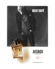 A perfume bottle labeled "Jusbox Beat Café" is placed in front of a monochrome photo of a person on an album cover titled "Beat Café," evoking the spirit of the Beat Generation and the soulful essence that Bob Dylan captured in 1962.