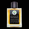 A square perfume bottle with a black cap labeled "Behold Patchouli" by Gallagher Fragrances. The label lists notes of orange citruses, frankincense, chocolate, patchouli, honeyed amber, and musk.