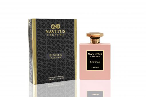 Image of a Navitus Parfums bottle labeled "Eidola" next to its matching box. The box is black with gold accents, and the bottle is pink with a gold cap. Crafted by master perfumers, this exquisite scent evokes the elegance of French Rose.
