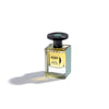 A bottle of Jusbox Black Powder, reminiscent of the rebellious spirit of Generation X, contains yellow liquid. It features a rectangular glass body and a black round cap, set against a white background.