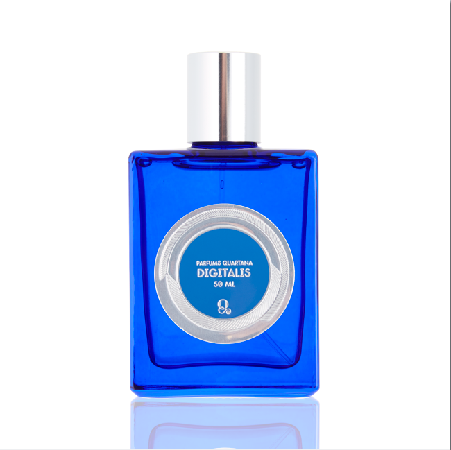 A 50 ml blue glass bottle of perfume labeled "Digitalis" by Parfums Quartana, featuring a reflective silver cap against a white background. The ozonic fragrance captures the essence of foxglove blooms.