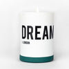 A Nomad Noe candle, labeled "DREAMER in London," placed against a plain white background.