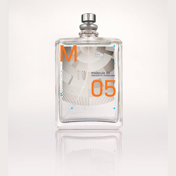 Clear perfume bottle with metallic cap and '05' label on front