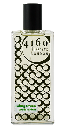 A clear rectangular bottle of 4160Tuesdays Ealing Green, adorned with a black cap and circular pattern design on the front, evokes the fresh green floral scents reminiscent of Shakespeare's A Midsummer Night's Dream.