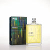 Eau de parfum bottle with silver cap and pale yellow liquid next to M03 multicolor box