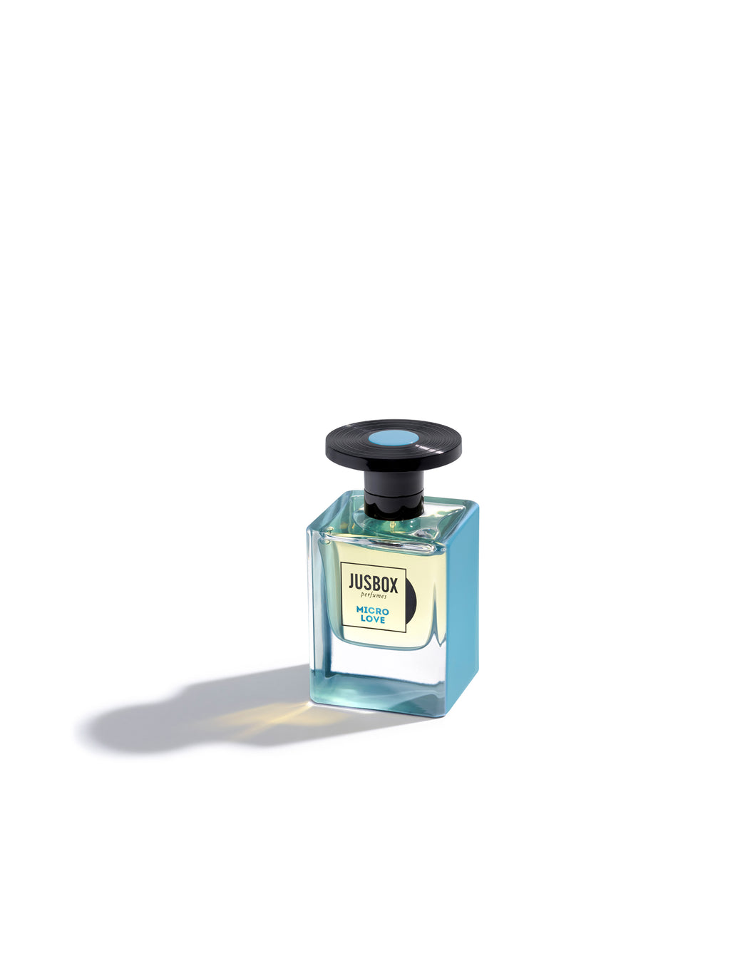 A square-shaped glass bottle of Jusbox's Micro Love perfume, featuring a black cap and filled with a light blue liquid, reminiscent of the sleek design in cutting-edge technology, set against a white background.