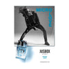 Black and white image of a person leaning sideways in stylish attire with a blue "MICRO LOVE" text, evoking the high-tech vibes of the Zoo TV tour. Below, there's a perfume bottle labeled "JUSBOX Micro Love" and a website link jusboxperfumes.com.