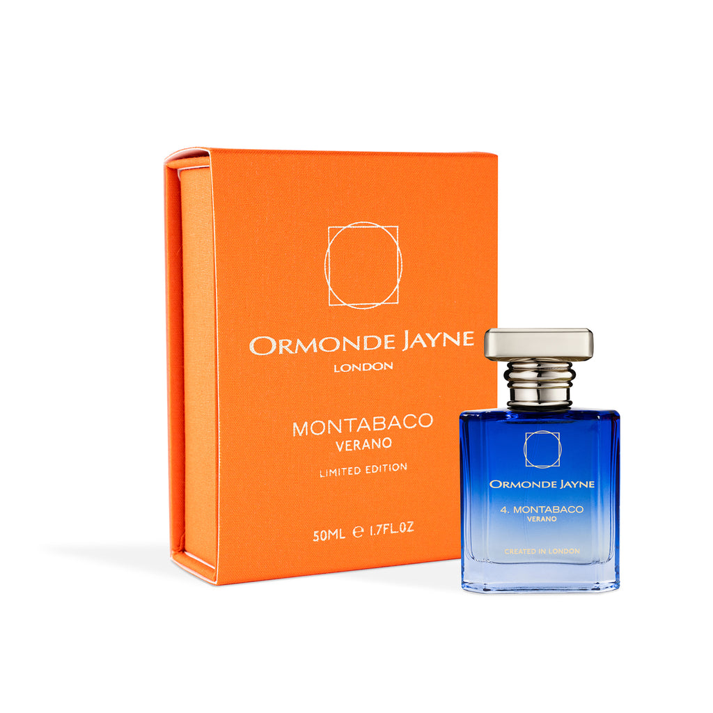 A blue bottle of Montabaco Verano by Ormonde Jayne sits next to its orange box. The limited edition fragrance holds 50ml (1.7 fl oz) and is labeled "Limited Edition.