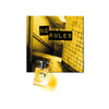 A perfume bottle, labeled "No Rules" from Jusbox, rests before a yellow-tinted image of a tiled stairwell with the words "NO RULES" in bold black letters, capturing the spirit of a punk fragrance crafted by Antoine Lie.