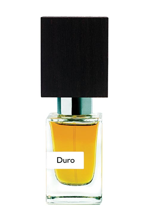 A clear glass bottle labeled "Duro," featuring amber liquid inside and topped with a large, black rectangular cap, exudes the essence of male strength from Nasomatto.