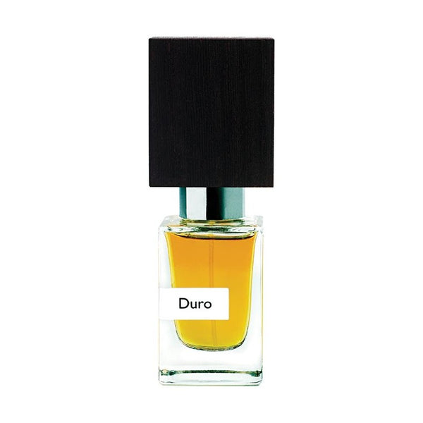 A clear glass bottle labeled "Duro," featuring amber liquid inside and topped with a large, black rectangular cap, exudes the essence of male strength from Nasomatto.