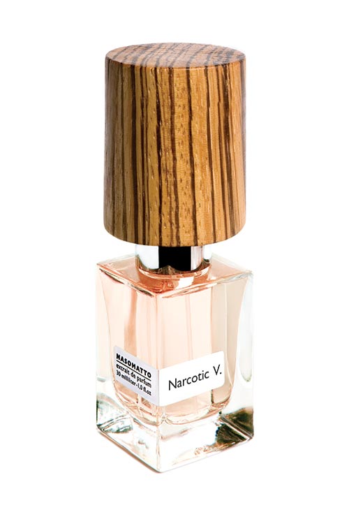 A bottle of perfume labeled "Nasomatto Narcotic Venus." The rectangular bottle features a clear base, light pink liquid inside, and a brown wooden cap. This fragrance encapsulates an essence of female sexual power with its intoxicating blend.