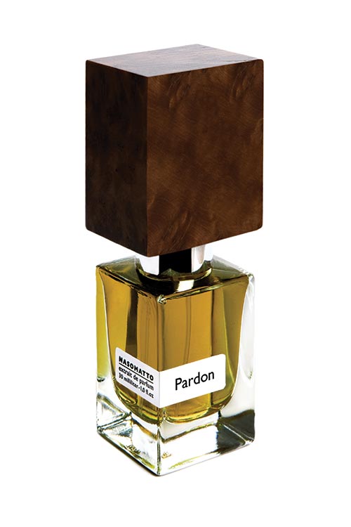 The "Pardon" by Nasomatto is a clear, rectangular glass perfume bottle featuring a brown, cube-shaped cap and filled with amber-colored liquid, perfectly capturing masculine elegance.