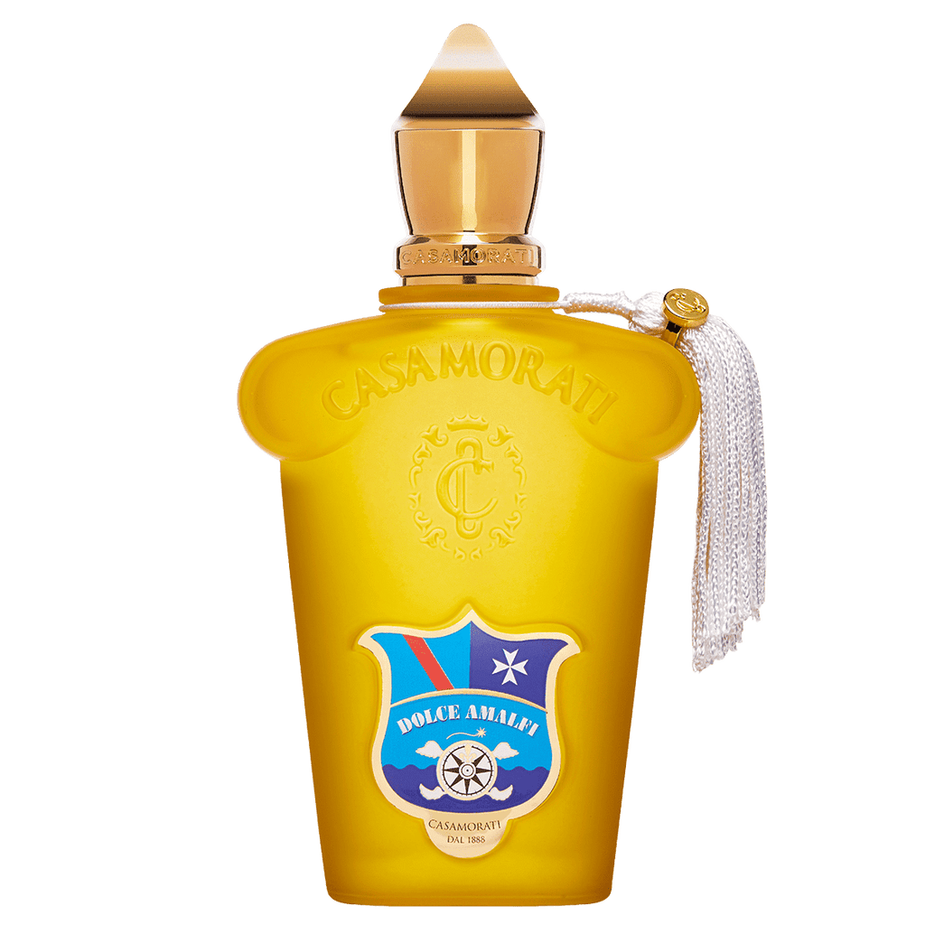 A romantic bottle of Dolce Amalfi perfume by Casamorati, adorned in yellow and embellished with a blue and red crest and a white tassel, capturing the enchanting essence of the Amalfi Coast.