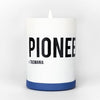 White cylindrical candle with blue base band and PIONEER TASMANIA label