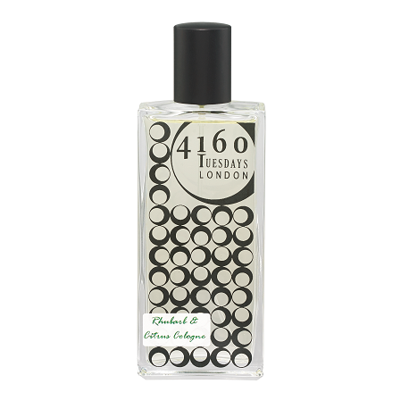 Clear glass bottle of 4160Tuesdays Rhubarb & Citrus Cologne with a black cap. The label features circular patterns and text, hinting at the zesty essence of grapefruit mingling with the fresh rhubarb notes inside.