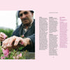 Nez Editions Rose book page with photo of hands holding pink roses next to text.
