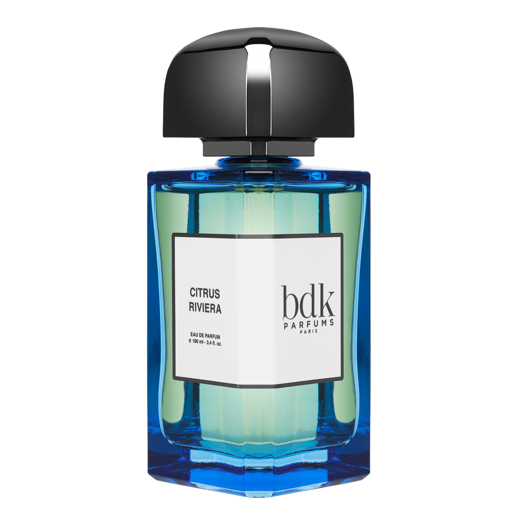 A bottle of Citrus Riviera by BDK Parfums, graced with Moroccan Neroli and featuring a blue-tinted glass and a black cap.