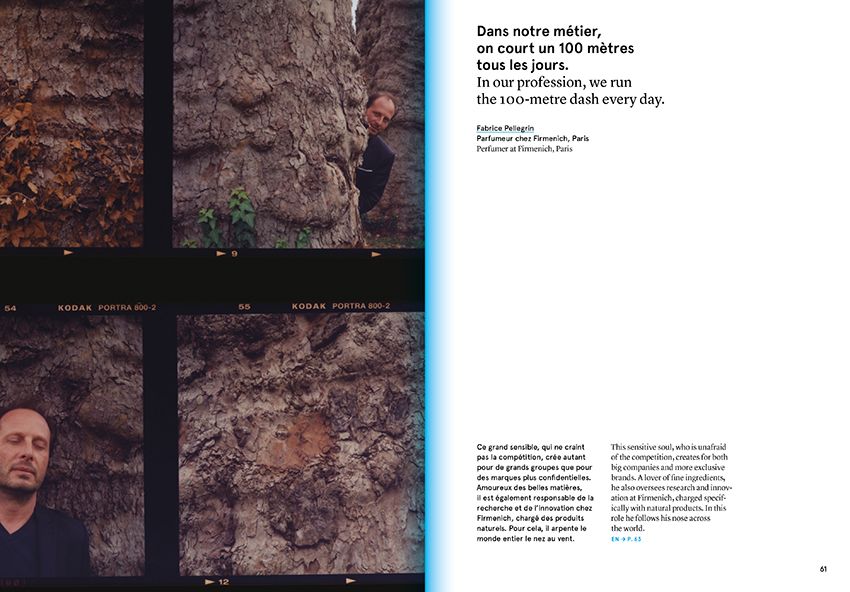 A person in a black coat stands near a rough stone wall, with a page featuring a French quote that delves into the daily routines of their profession intertwined with the art of perfume. The texts in both French and English evoke an atmosphere reminiscent of olfactory exhibitions. The scene mirrors aspects highlighted in "Smell, Feel. Perfumers, Odors, and Emotions" by Nez.