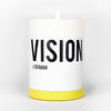 White candle jar with yellow band, printed VISION and Esfahan