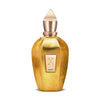 A golden perfume bottle with a pointed cap and a front label reading "Xerjoff Accento Overdose." The olfactory notes capture an intoxicating essence, reminiscent of the luxurious Accento Overdose.