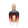 A dark amber glass perfume bottle with a gold-toned cap and label, featuring the text "Alexandria II" and a letter "X" at the bottom, evokes an aura as rich as its scent with subtle hints of Laotian oud.