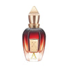 A bottle of Xerjoff Alexandria II with a gold cap and gradient red glass bottle, featuring notes of Laotian oud.