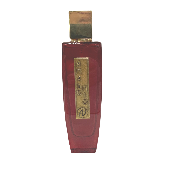 A rectangular red perfume bottle with a gold cap and a gold label on the front displaying the text "AMADO MIO" by Antonio Alessandria and a small logo at the bottom, evoking the deep allure of woody notes.
