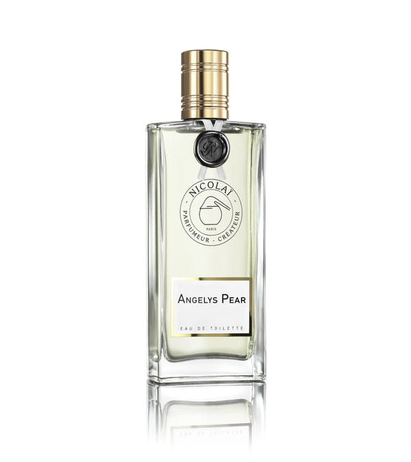A clear glass bottle of Nicolaï Angelys Pear Eau de Toilette, featuring a gold cap and a round seal displaying the brand's logo, captures the essence of a fresh fragrance inspired by the scenic Loire Valley.