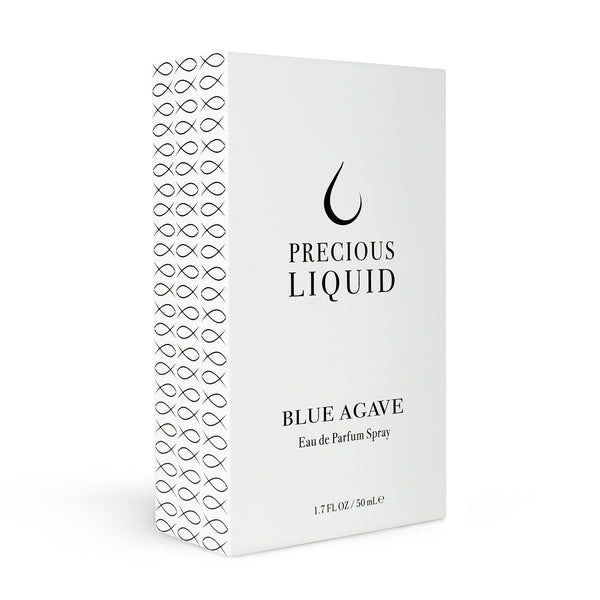 A white box of Precious Liquid Blue Agave, with minimalist black text and pattern design, hints at a delicate blend of blue agave and juniper berries for a woody fragrance.
