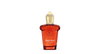A red perfume bottle with a gold cap, labeled "Casamorati" and "Bouquet Ideale," embodies the luxurious allure of Italian perfumery with its spicy oriental fragrance.