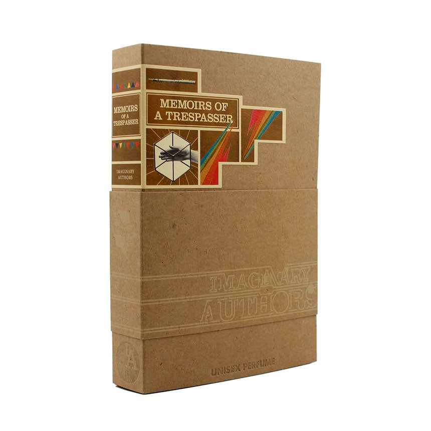 A bottle of perfume, named "Memoirs of a Trespasser" by Imaginary Authors, is cleverly designed to resemble a book and boasts an adventurous scent highlighted with Madagascar Vanilla.