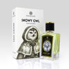 A perfume bottle and box labeled "Snowy Owl" by Zoologist. The box features a drawing of a snowy owl wearing a cloak. The bottle has a golden cap and a label matching the box design, encapsulating the coconut vanilla scent with undertones of musk fragrance.