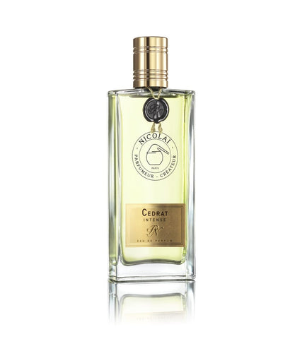 Cedrat Intense eau de parfum bottle with gold cap and clear glass body