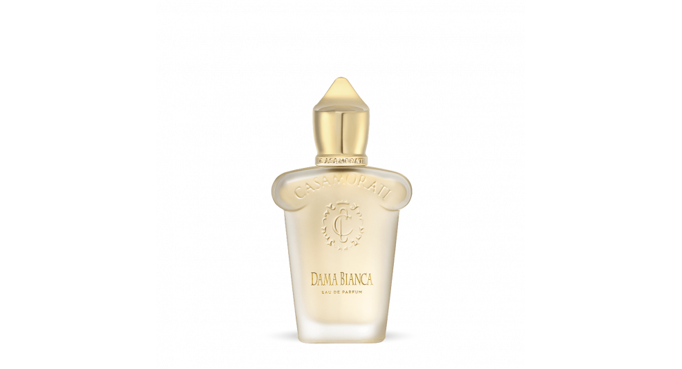 A frosted glass perfume bottle with a golden cap. The label reads "Casamorati" and "Dama Bianca, Eau de Parfum," evoking the essence of a vintage scent from an Italian perfumery.