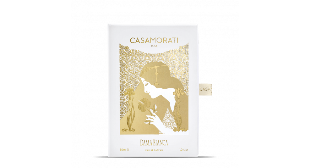 A Casamorati Dama Bianca perfume box adorned with a gold and white design, showcasing an illustration of a woman holding a flower, encapsulating the timeless charm of Italian perfumery.