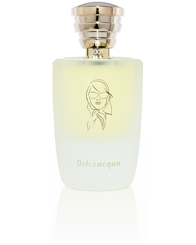 A frosted glass perfume bottle with a gold cap, featuring an illustration of a woman and the text "Dolceacqua" on the label by Masque Milano. This limited edition release captures Cote d'Azur flavors in 100ml hand-numbered bottles, ensuring each piece is unique.