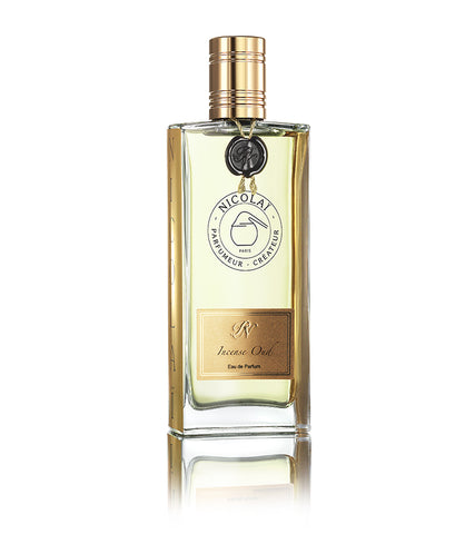 Oud incense eau de parfum glass bottle with gold cap and front label