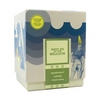 A scented candle box labeled "Meet Me in the Meadow" from Imaginary Authors features fragrances of grapefruit, linden, and pinot gris. The design includes abstract illustrations and a yellow sticker reading "Imaginary Authors Perfumed Candle." This soy blend candle from Imaginary Authors offers a 60-hour burn time.