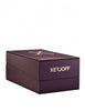 A closed, rectangular, dark purple box featuring "Xerjoff" printed in gold lettering on the side and a gold emblem on the lid hints at the luxurious "More Than Words" oud fragrance within.