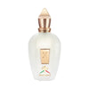 A white perfume bottle with a golden cap and emblem, labeled "Renaissance" at the bottom with colorful graphics, hints subtly at Italian citrus and Calabrian bergamot from Xerjoff.
