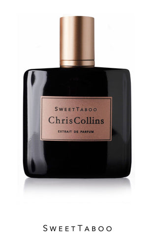 Perfume bottle with black glass, gold cap, and Sweet Taboo Chris Collins label