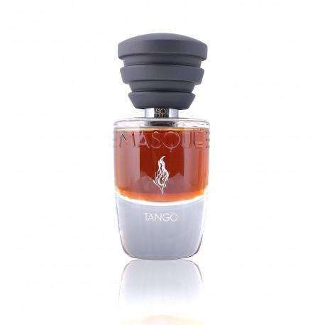 A bottle of Masque Milano's Tango fragrance, featuring amber-colored liquid in a clear container with a black capped lid, offers an exquisite experience of sensual perfume.